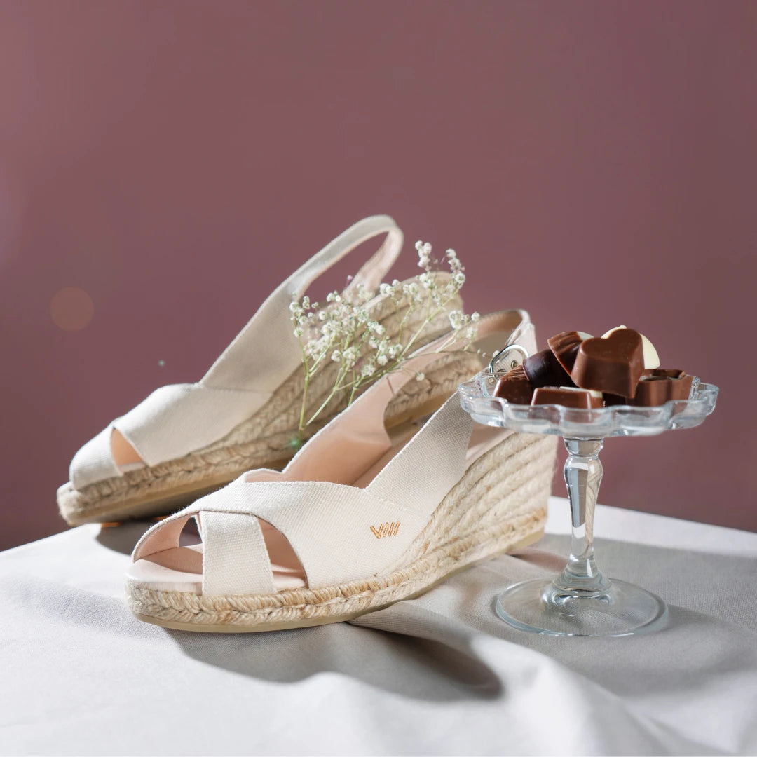 Llansa canvas beige espadrilles next to chocolates for Valentine's Day